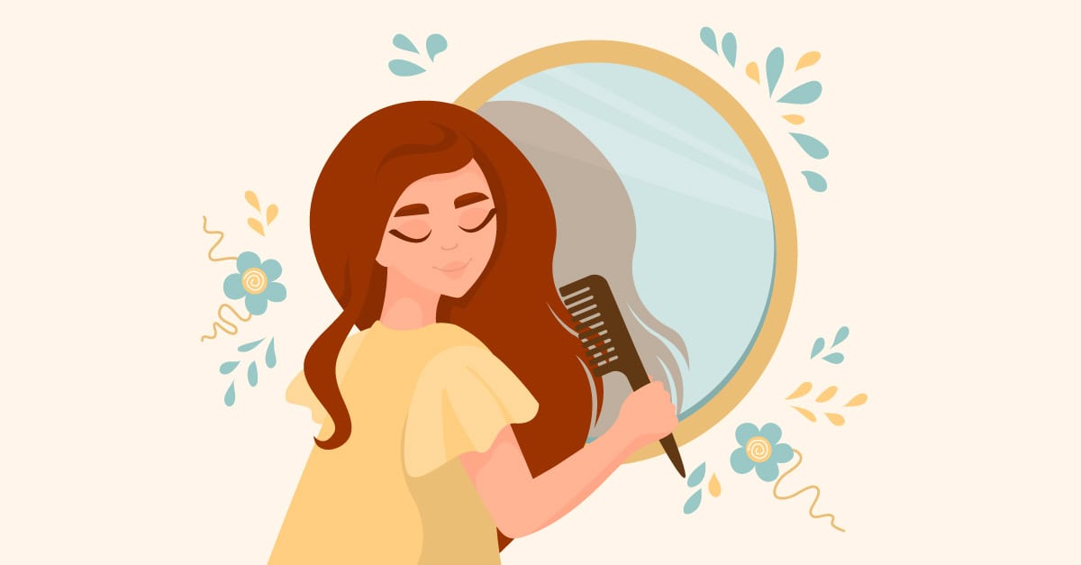 Women brushing her hair in front of a mirror